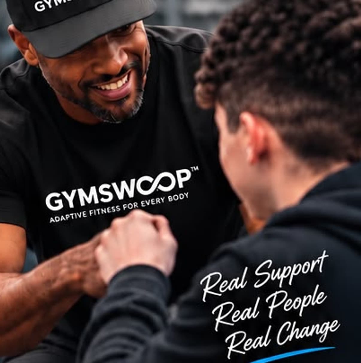 A Gymswoop mentor and a young person bumping fists after a session